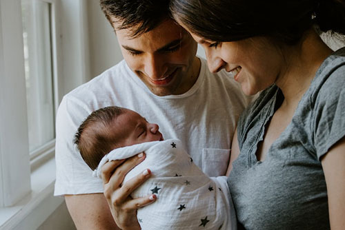 "Postpartum newborn care - Compassionate support and guidance for parents in caring for their newborn during the postpartum period."
